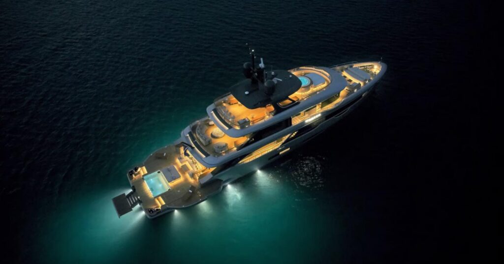 Charter minded yacht buyer out on water at night